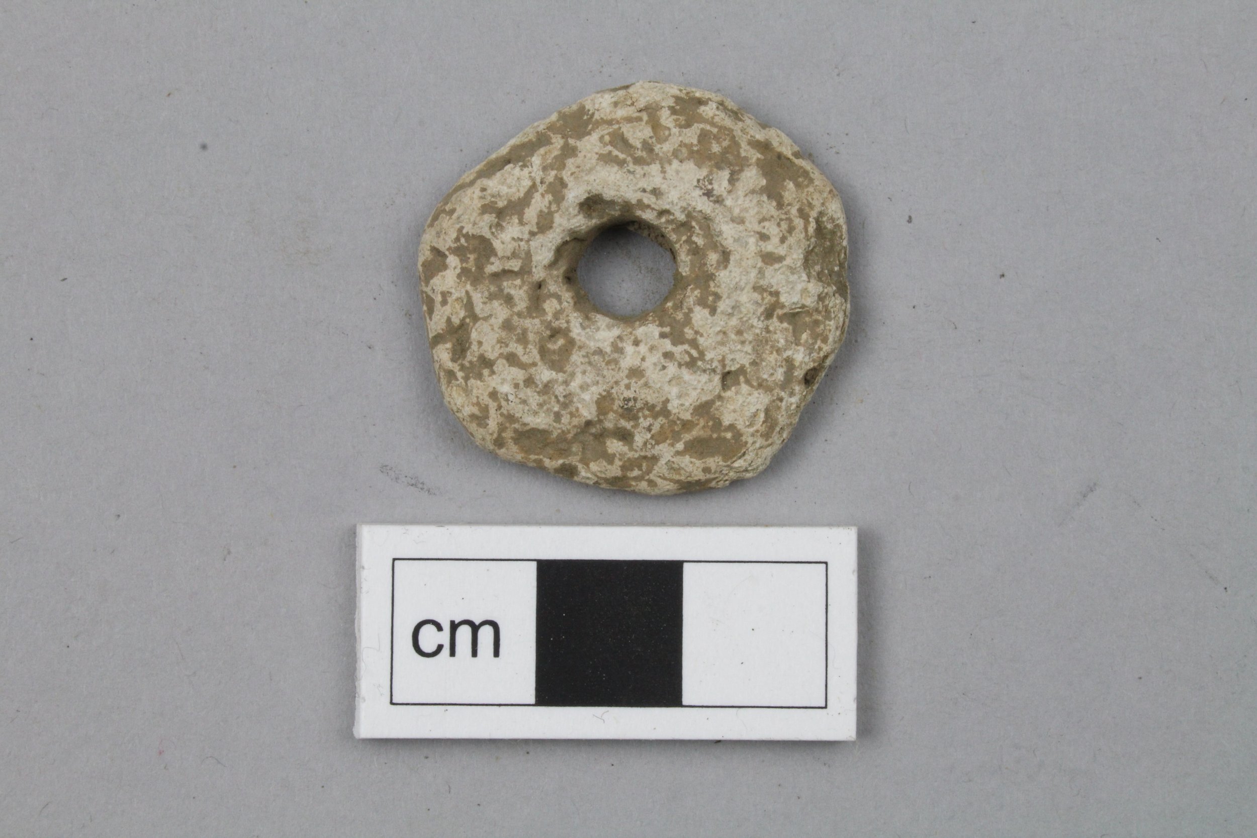 Lead Spindle Whorls — AOC Archaeology Group