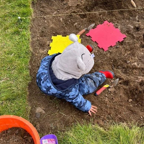 Time for some 'What's That?' Wednesday!
"What's that?" I hear you say.
That's the Carsphairn Bairn Banter group who came on site last Saturday, when they made great progress revealing what remains of the cairn material in the kerbed ca