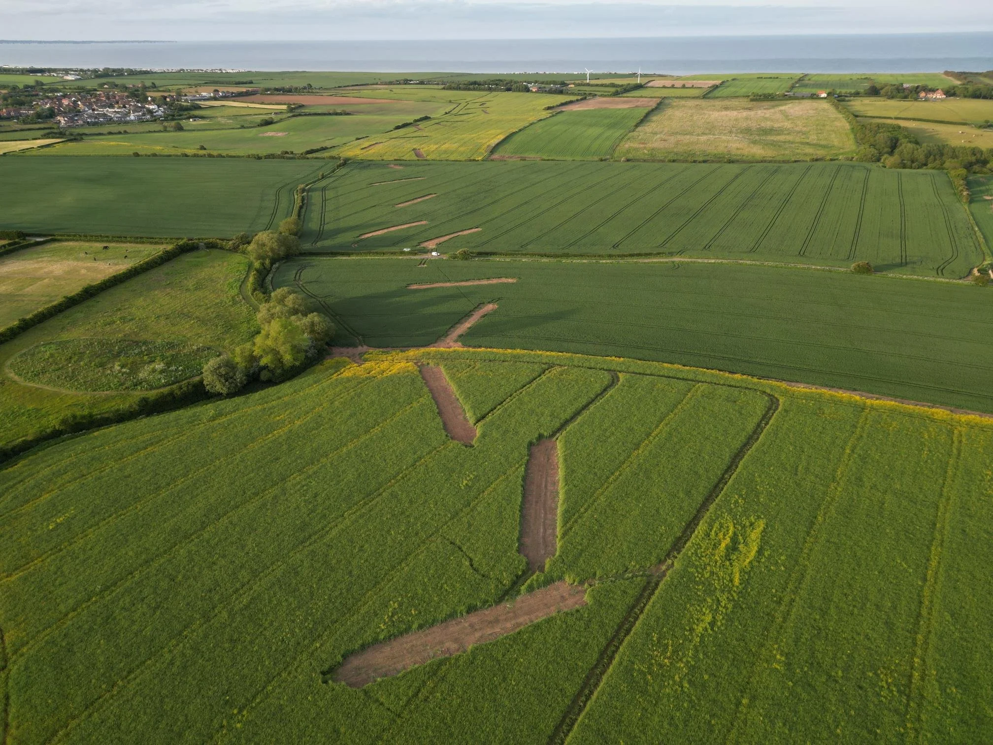 Our eye in the sky has captured the telltale footprint of archaeologists on the move across the East Yorkshire countryside. Our team made great progress this summer carrying out archaeological evaluation along the route of the onshore export cable ro