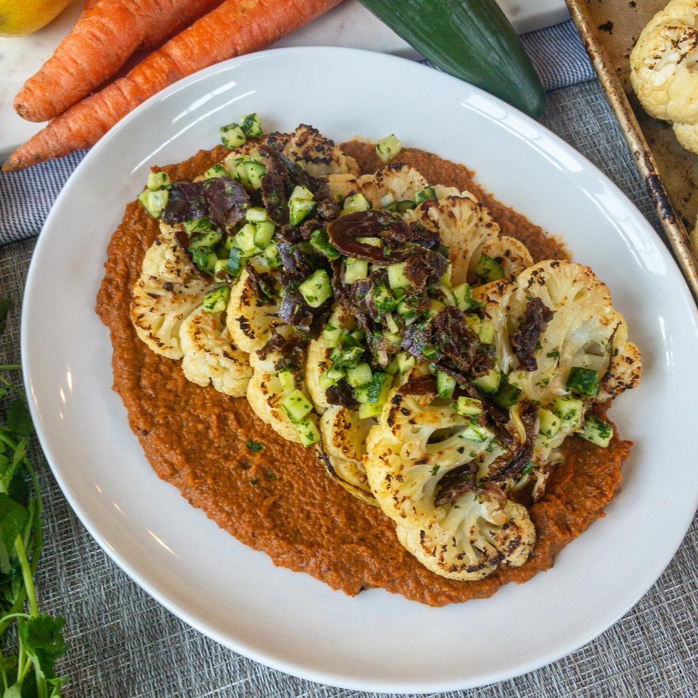 Cauliflower steaks with smoked carrot puree and cucumber mint salad. 
If you&rsquo;re craving some variety in your Keto/Paleo diet, this dish has everything. 
The buttery richness from the cauliflower steaks sits atop a smoked and charred carrot pure