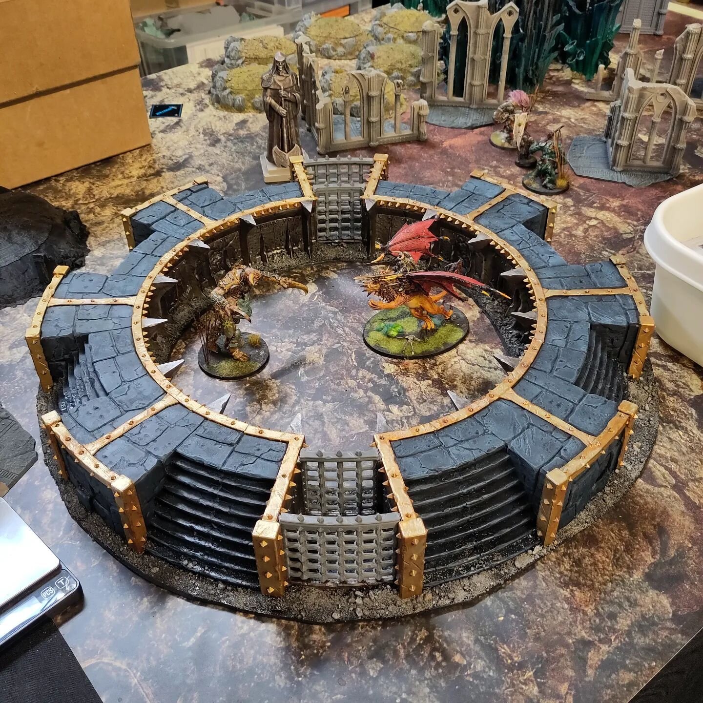 This chaos gladiator pit designed by @darkfantasticmills will be on sale at #salute. It just needs the gates finishing and maybe a few skulls. #skullsfortheskullthrone  #chaos