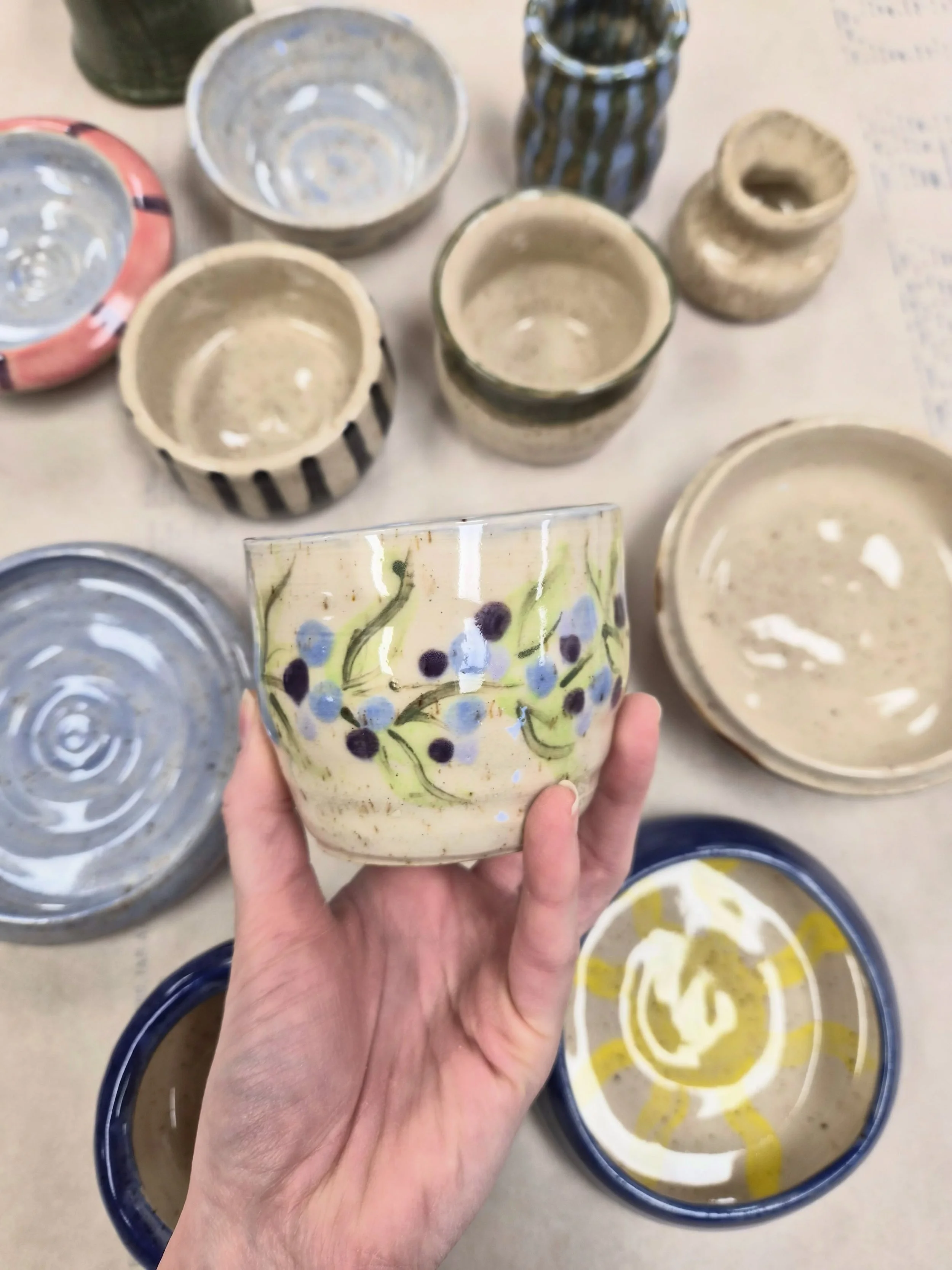 We love a good kiln unloading session! 🤩 Check out what our recent Try it on the Wheel for Adults students have created so far this spring! 🌷🌼