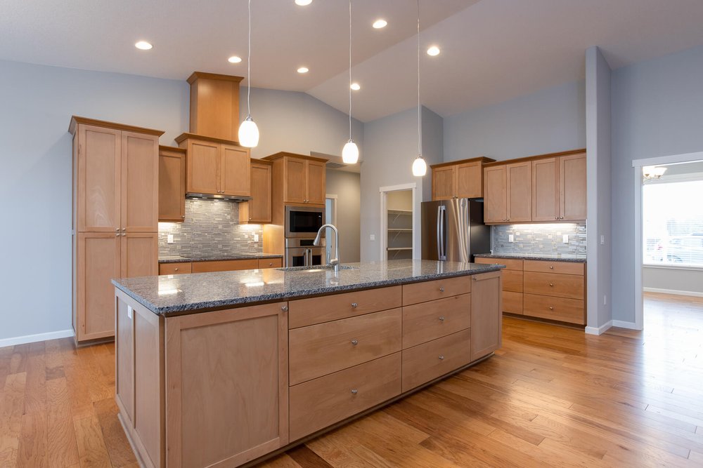 modern kitchen with lots of storage and counter tops albany oregon