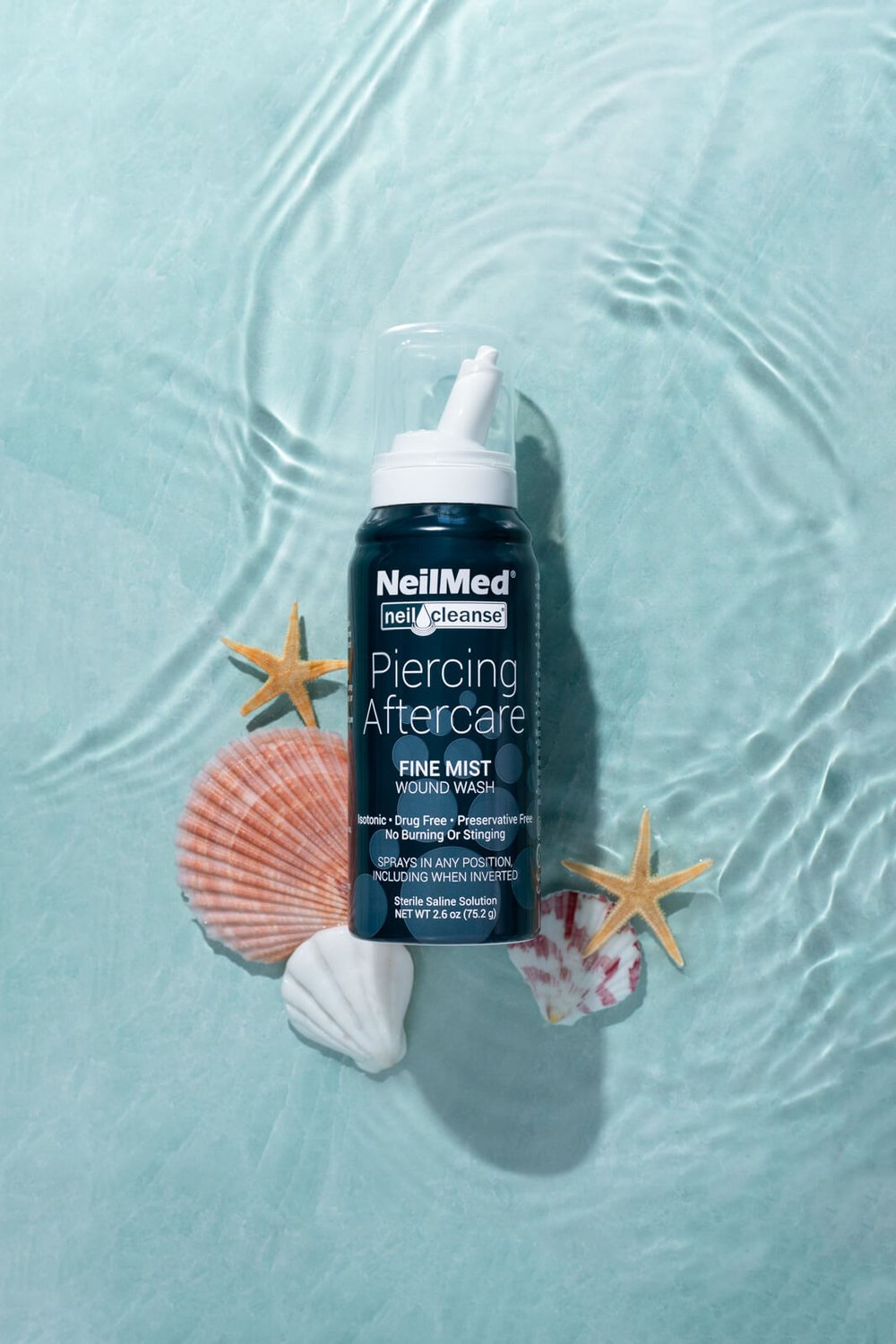 neilmed piercing and aftercare fine mist in water with seashells