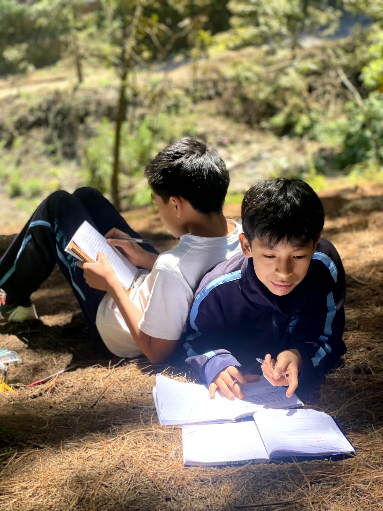 Colegio Horeb students studying outside in San Juan Cotzal, Guatemala