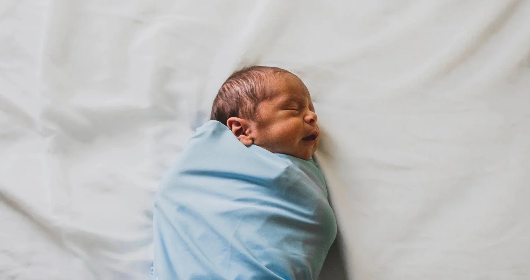 photo-of-new-born-baby-covered-with-blue-blanket-3617843.jpg