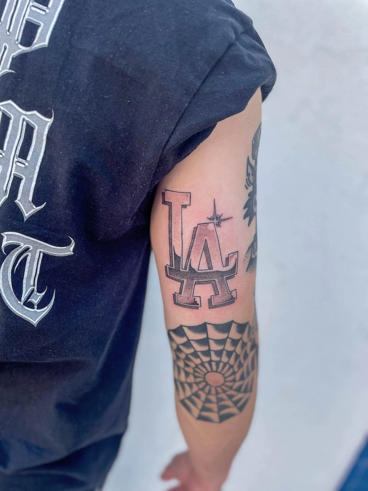Jose Araujo Classic Tattoo Dodgers logo.JPEG