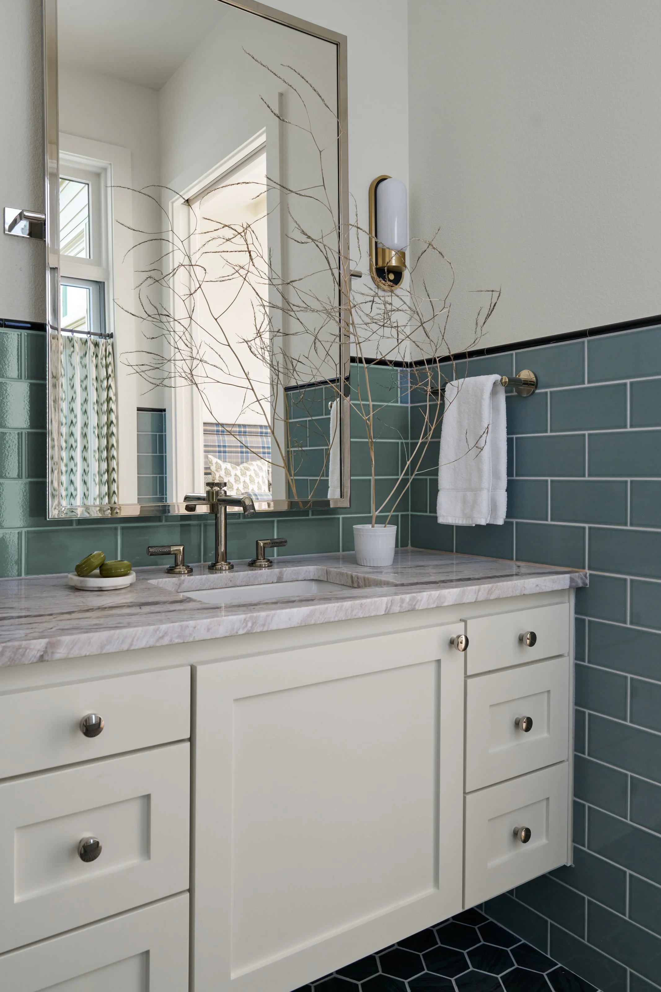 Guest_bathroom_with_teal_subway_tile.jpg