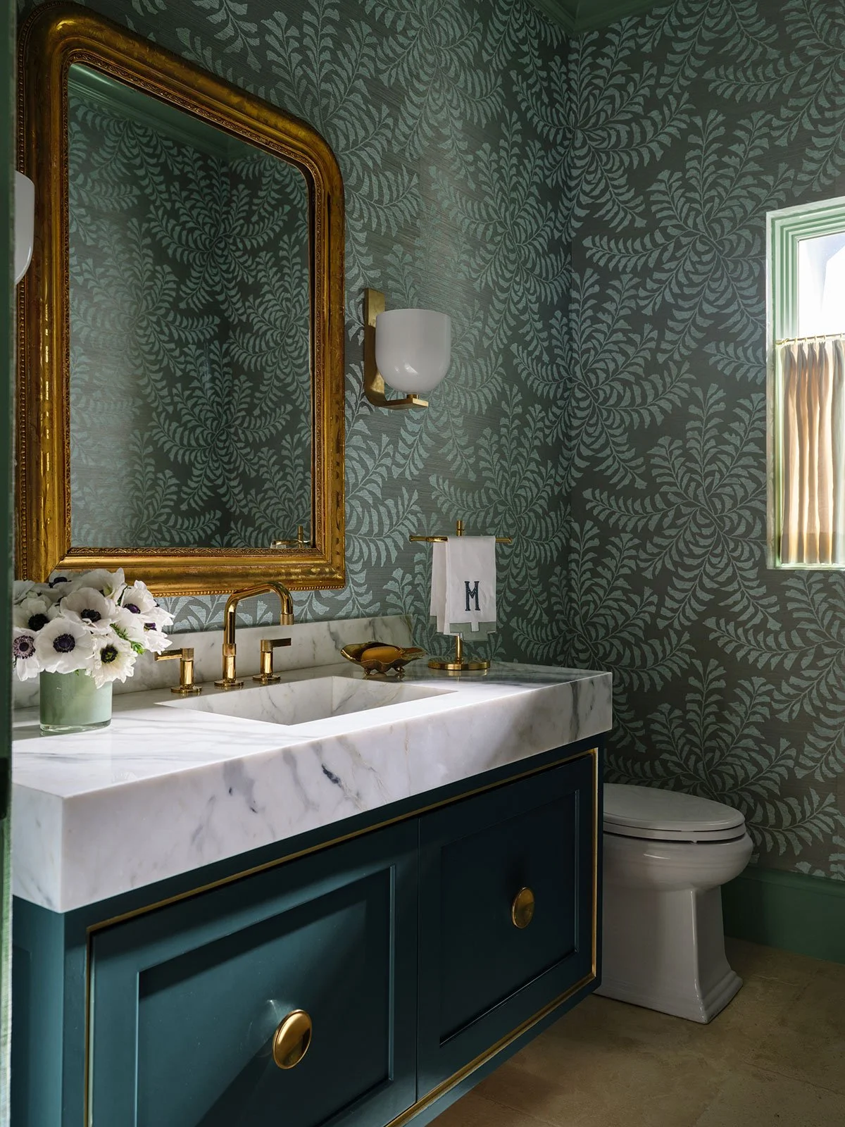 15.Fort_Worth_Home_Blue_Floral_Powder_Bath_Design_with_Fresh_Flowers_and_Monogrammed_Hand_Towel_with_Sconces.jpg