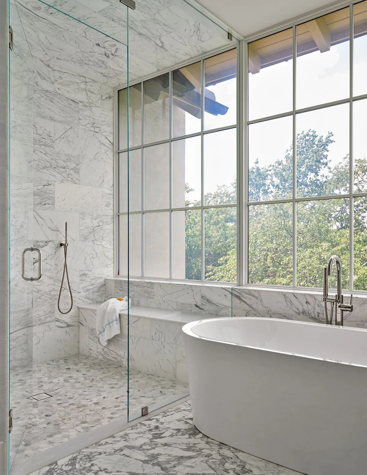 38. Fort_Worth_Home_Primary_Bathroom_with_Large_and_Small_Format_Stone_Tiles.jpg