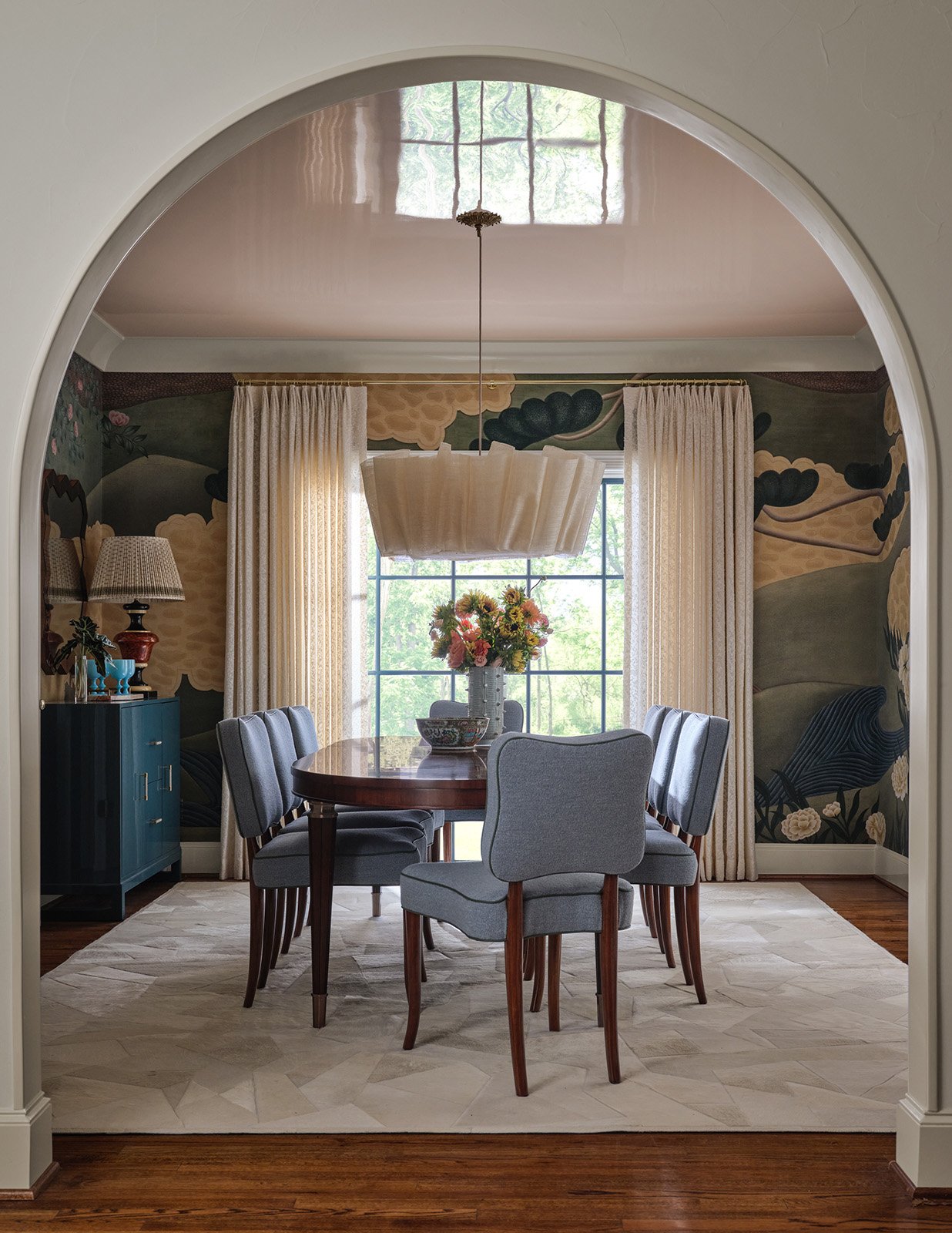 4. Formal_Dining_Room_with_Gloss_Ceiling_Custom_Rug_and_Florals_with_the_Drapery_Open.jpg
