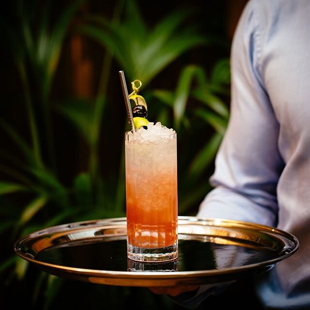 The Singapore Sling

The legend goes that the original Singapore Sling recipe dates back over a century, originally created by Ngiam Tong Boon, a Hainanese bartender who was working at Raffles Hotel in Singapore. Since then there has been some discre