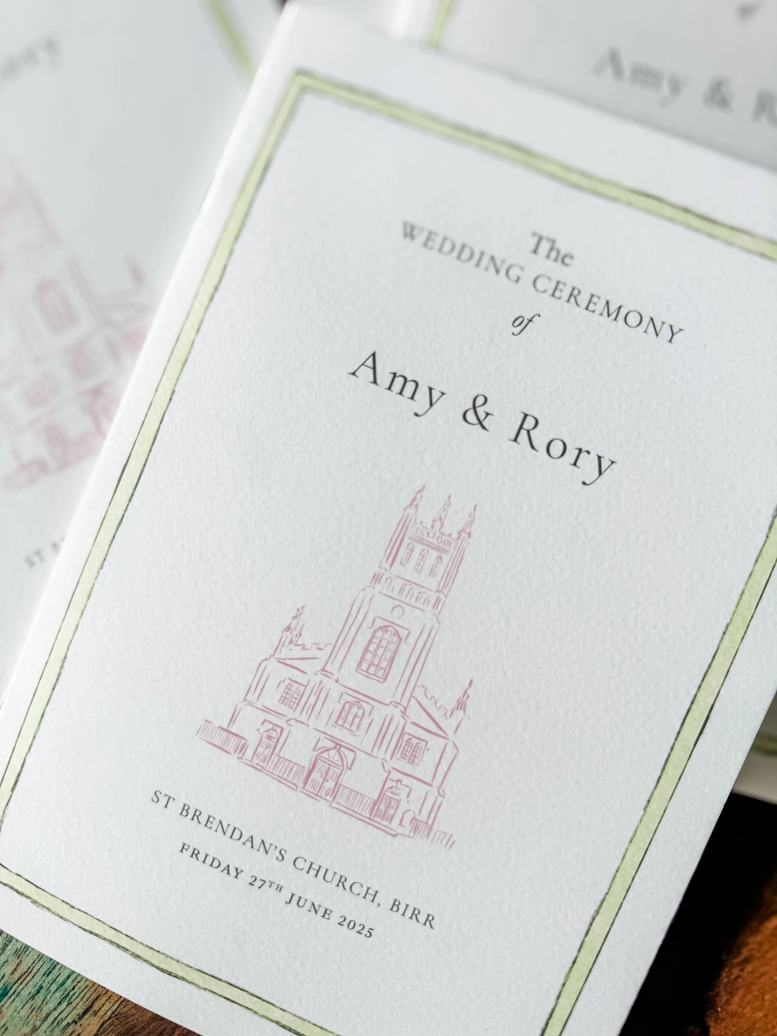 Wedding invitation for Amy and Rory featuring a church illustration and event details at St Brendan’s Church, Birr, on June 27, 2025.