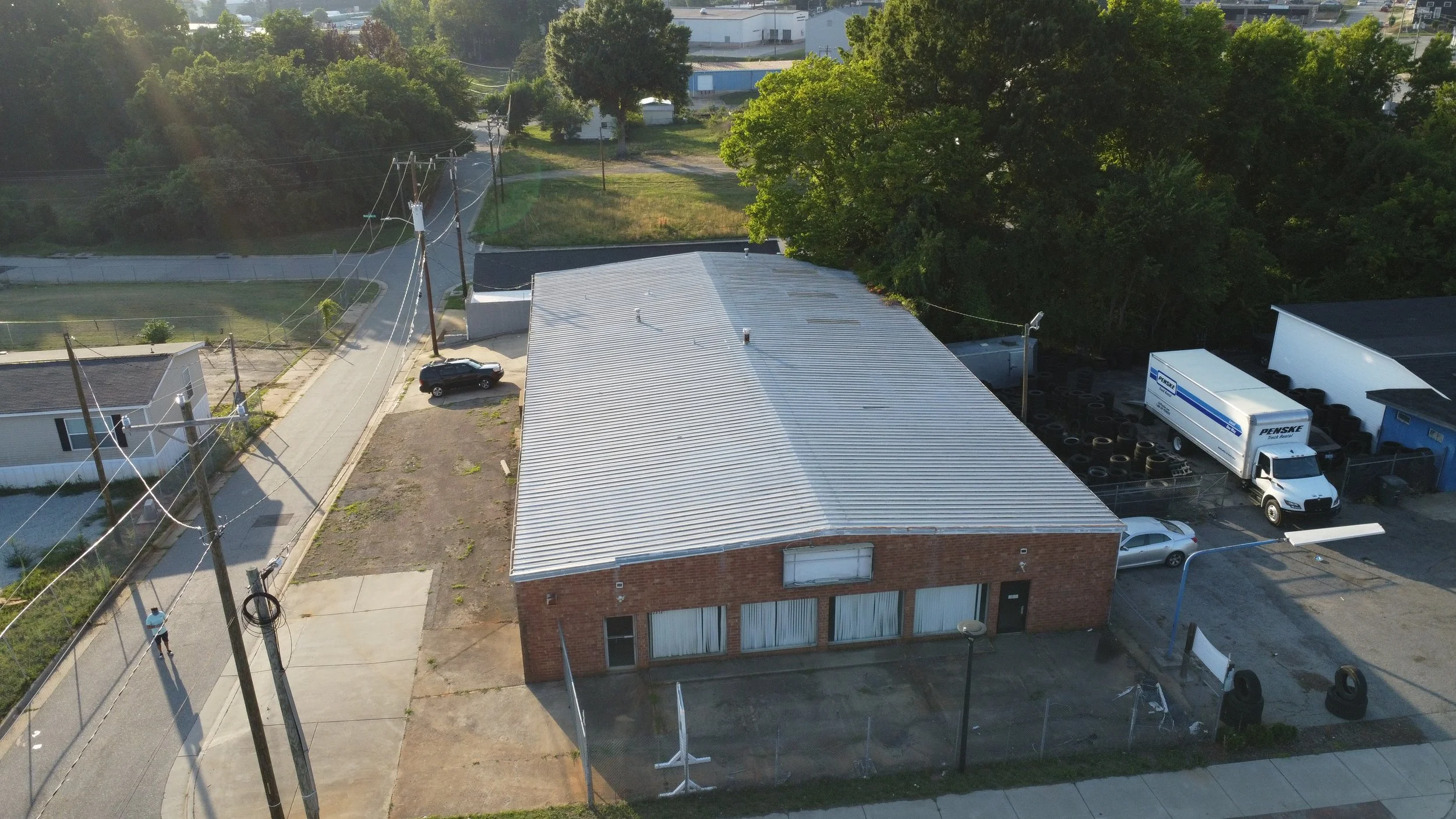 Freestanding commercial building for sale across from Greensboro Coliseum Complex suitable for retail, showroom, office, service, entertainment, or specialty commercial uses