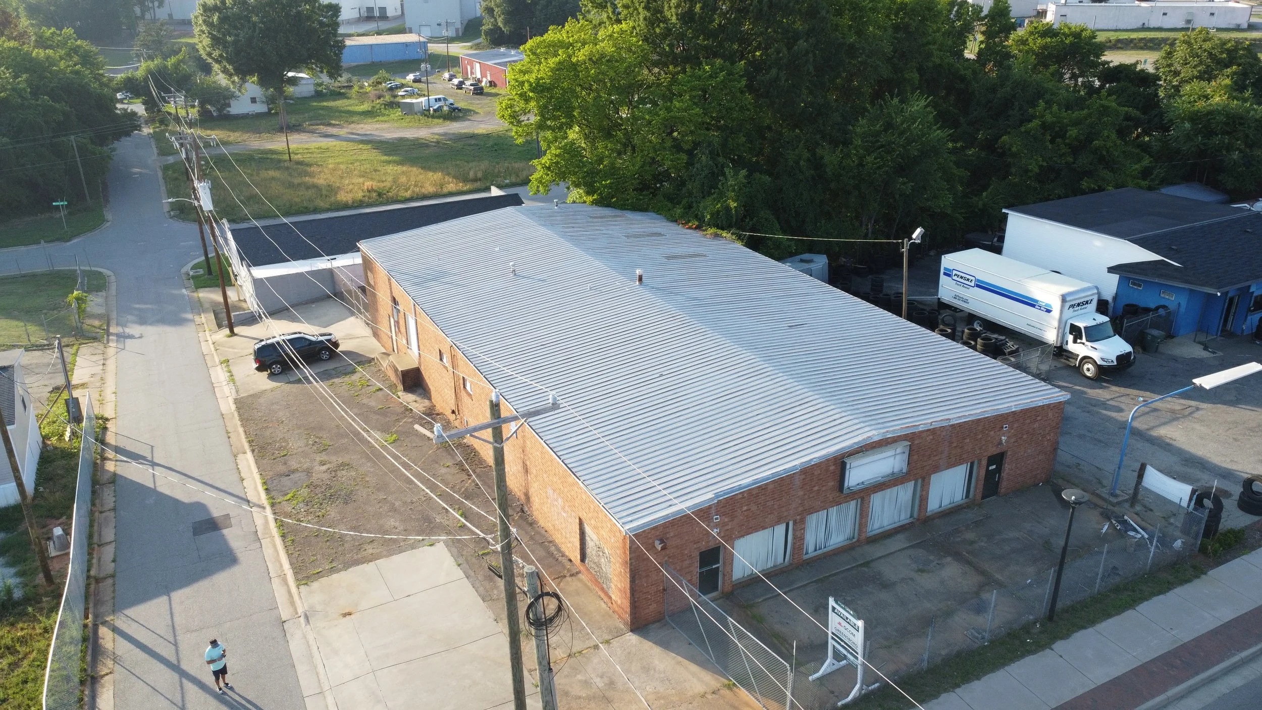 Freestanding commercial building for sale across from Greensboro Coliseum Complex suitable for retail, showroom, office, service, entertainment, or specialty commercial uses