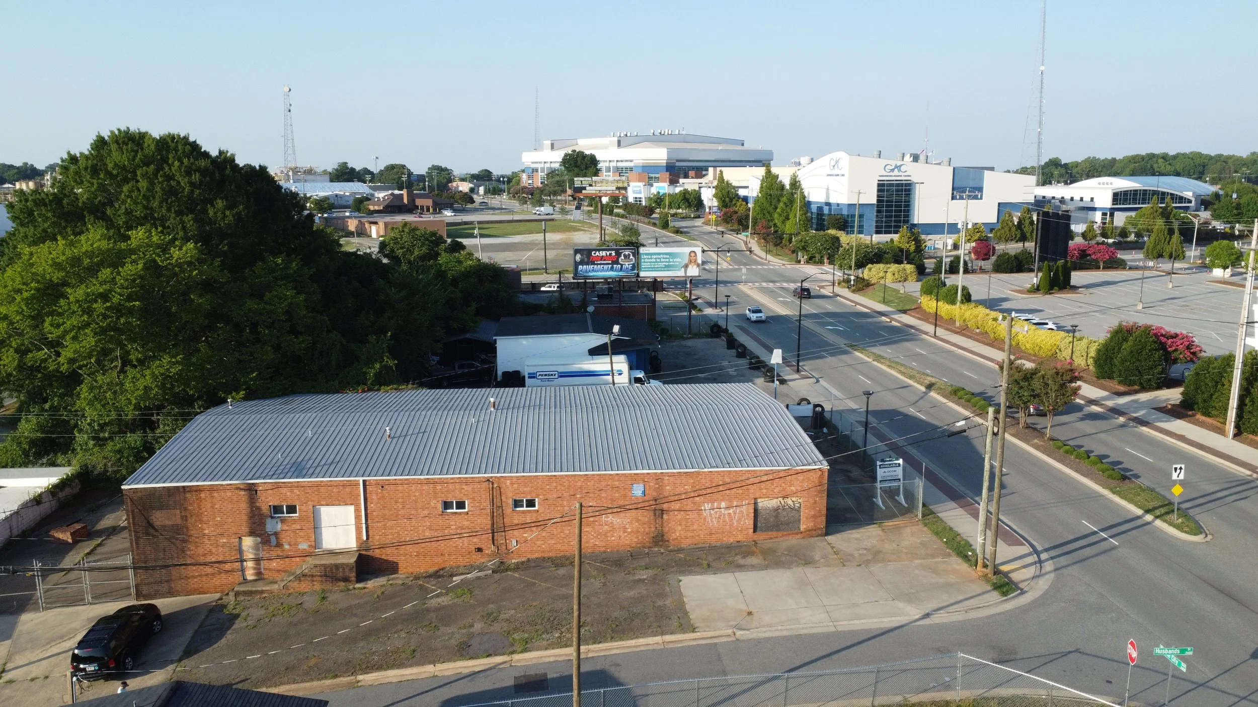Freestanding commercial building for sale across from Greensboro Coliseum Complex suitable for retail, showroom, office, service, entertainment, or specialty commercial uses