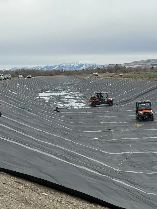 A Twin Falls canal lining project using geomembrane liners for installation.