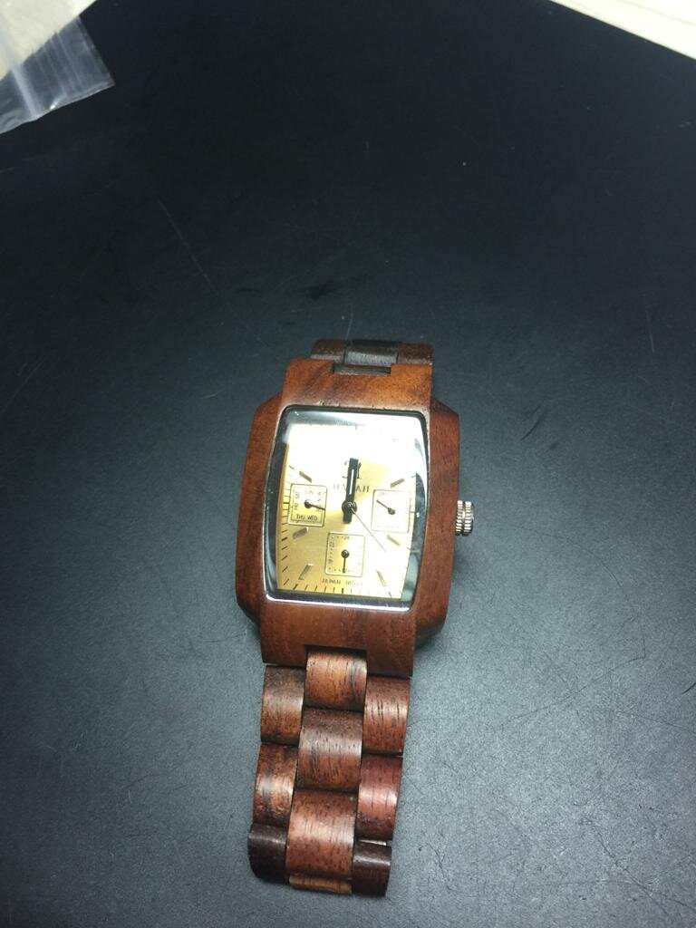 Koa Hawaii wood watch in for a new movement from Inverurie Aberdeenshire.