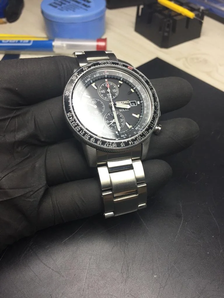 Seiko Solar V172 0AC0 watch in for new glass and polish from Sydenham, South East London.