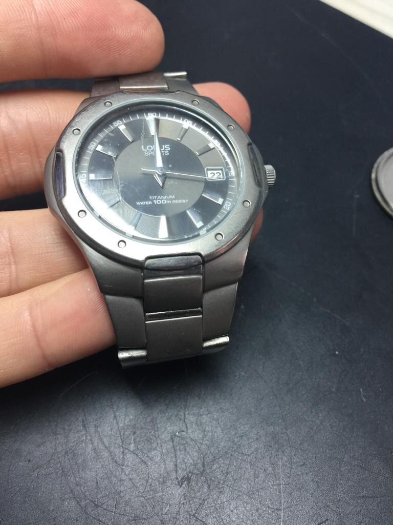 Lorus titanium watch VX42 X095 grey date.jpeg
