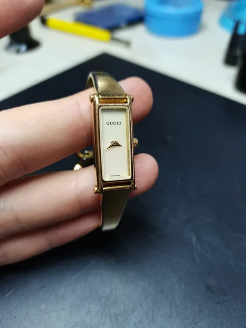 Gucci 1500l gold deals