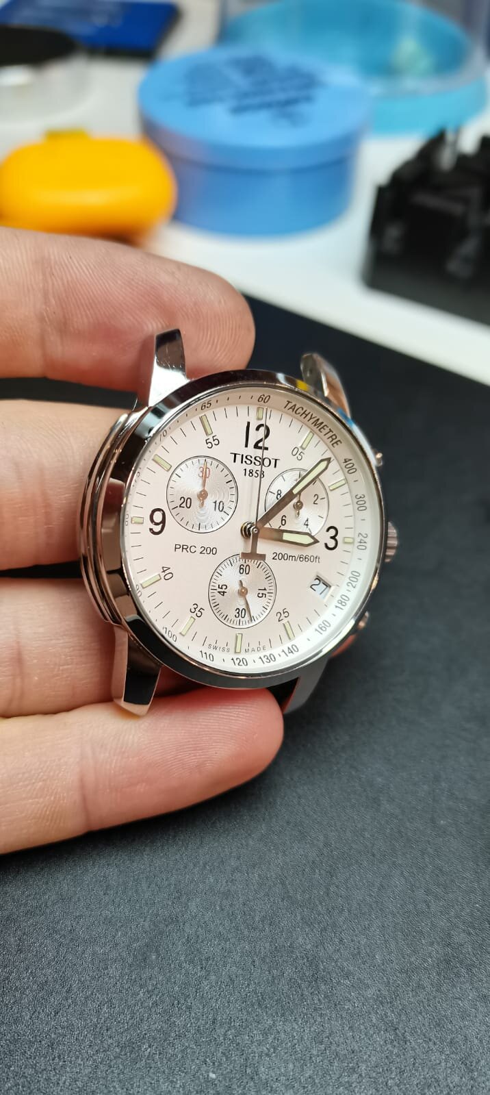 White dial Tissot watch stop watch.jpeg