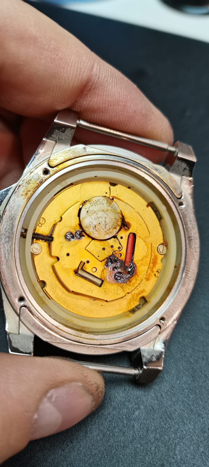 Gucci watch full of water and rusted beyond repair. New movement fitted..jpeg