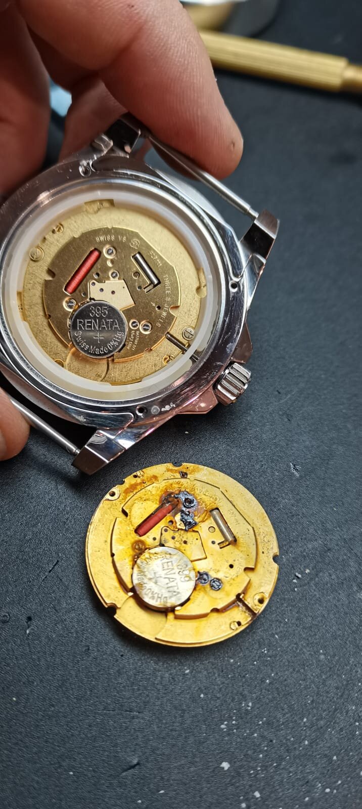 Gucci watch movment rusted inside.jpeg