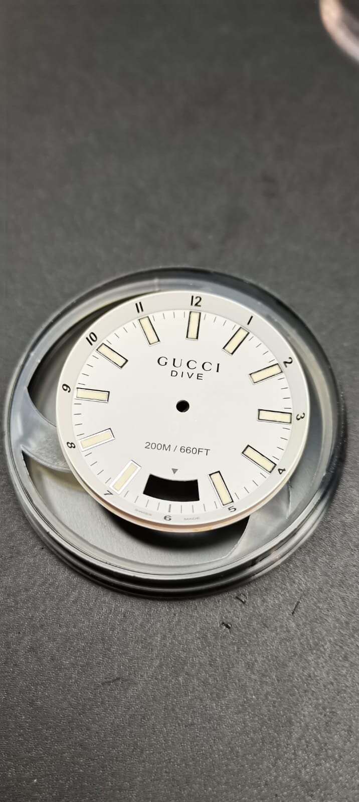 Gucci whaite dial with corroded batons cleaning restoring.jpeg