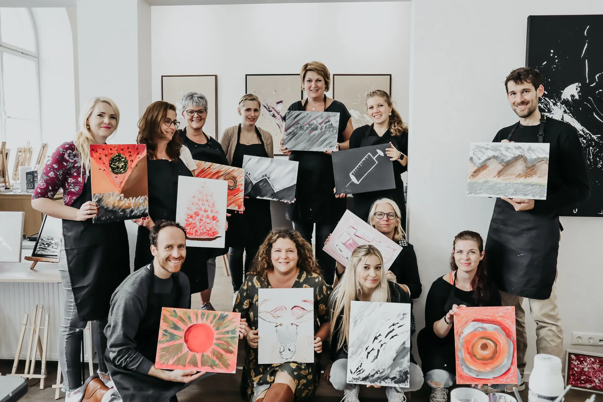 Bildkarussell Teamevent München: ART-LIs einzigartiges Teamformat erklärt