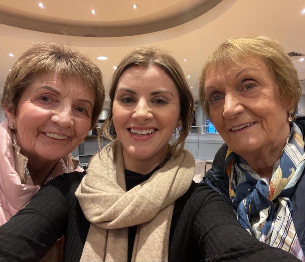 Three ladies waiting to go on stage