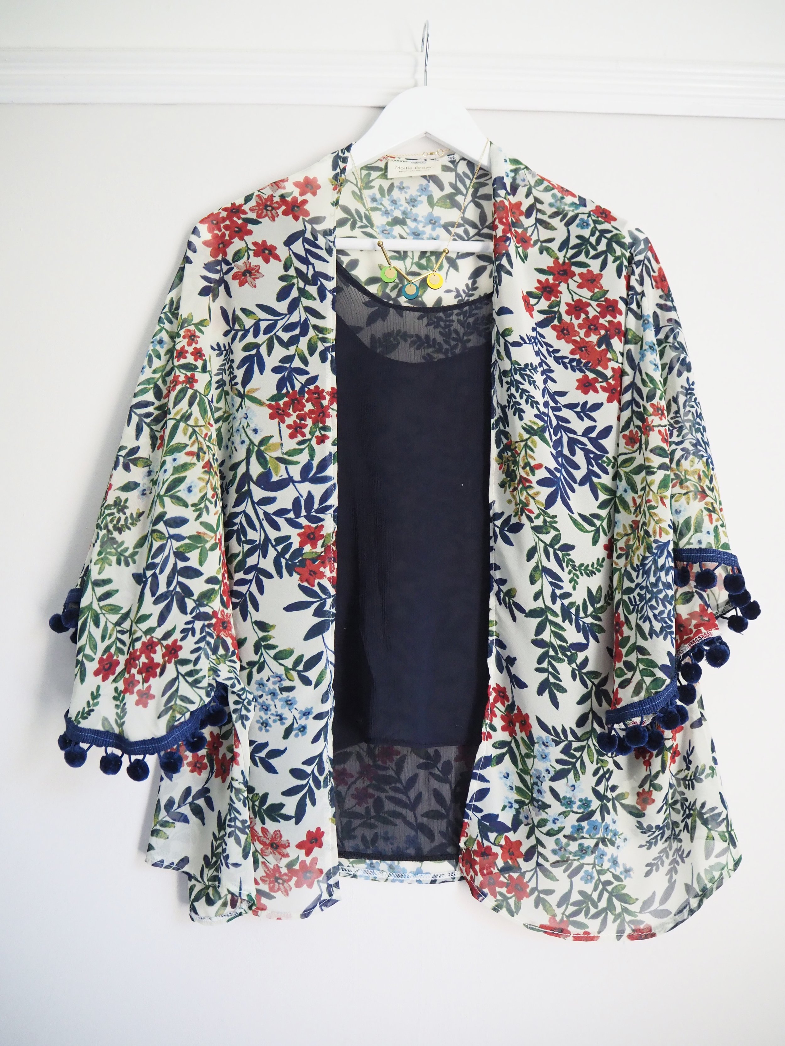 Floral kimono with pom pom trim
