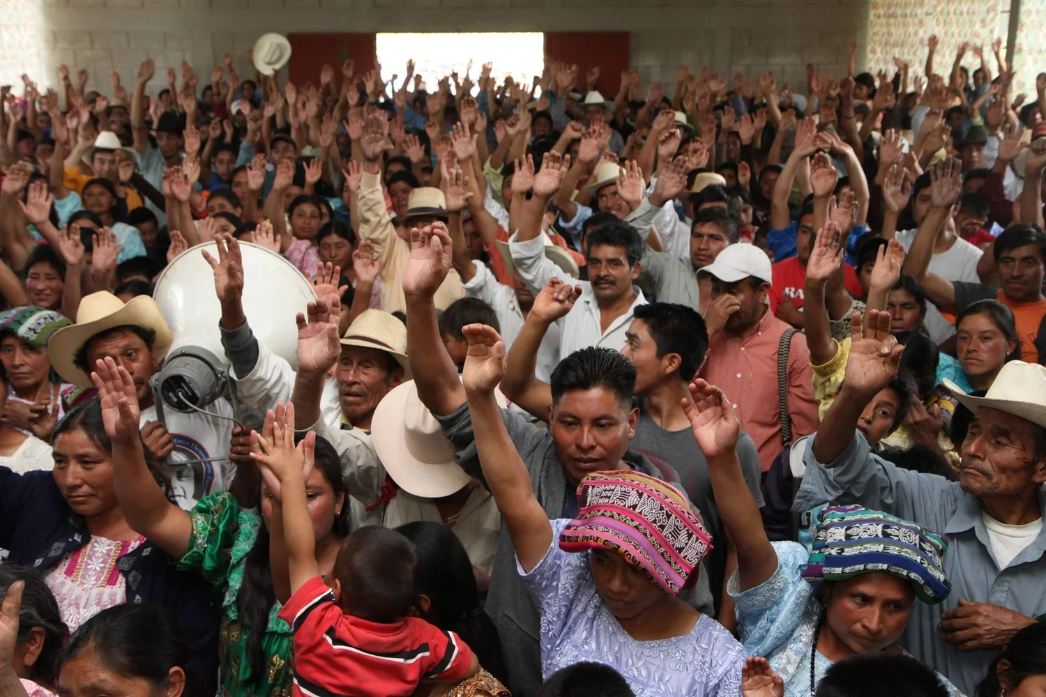 Figure 13. Consultation in Santa Cruz Quiché. Residents of Cantón Pajajxit I, II, and III vote during the community consultation on the exploitation of natural resources. On a historic day, residents from the municipality of Santa Cruz del Quiché—one