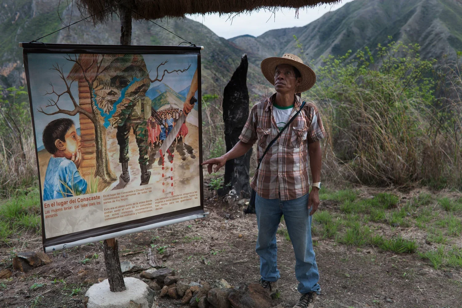Figure 2. Río Negro Massacres and the Chixoy Dam. Massacre survivor Sebastian Iboy Osorio explains to a delegation the repressive events that took place on that spot known as the Conacaste Tree on March 13, 1982. Río Negro, Rabinal, Baja Verapaz, Gua