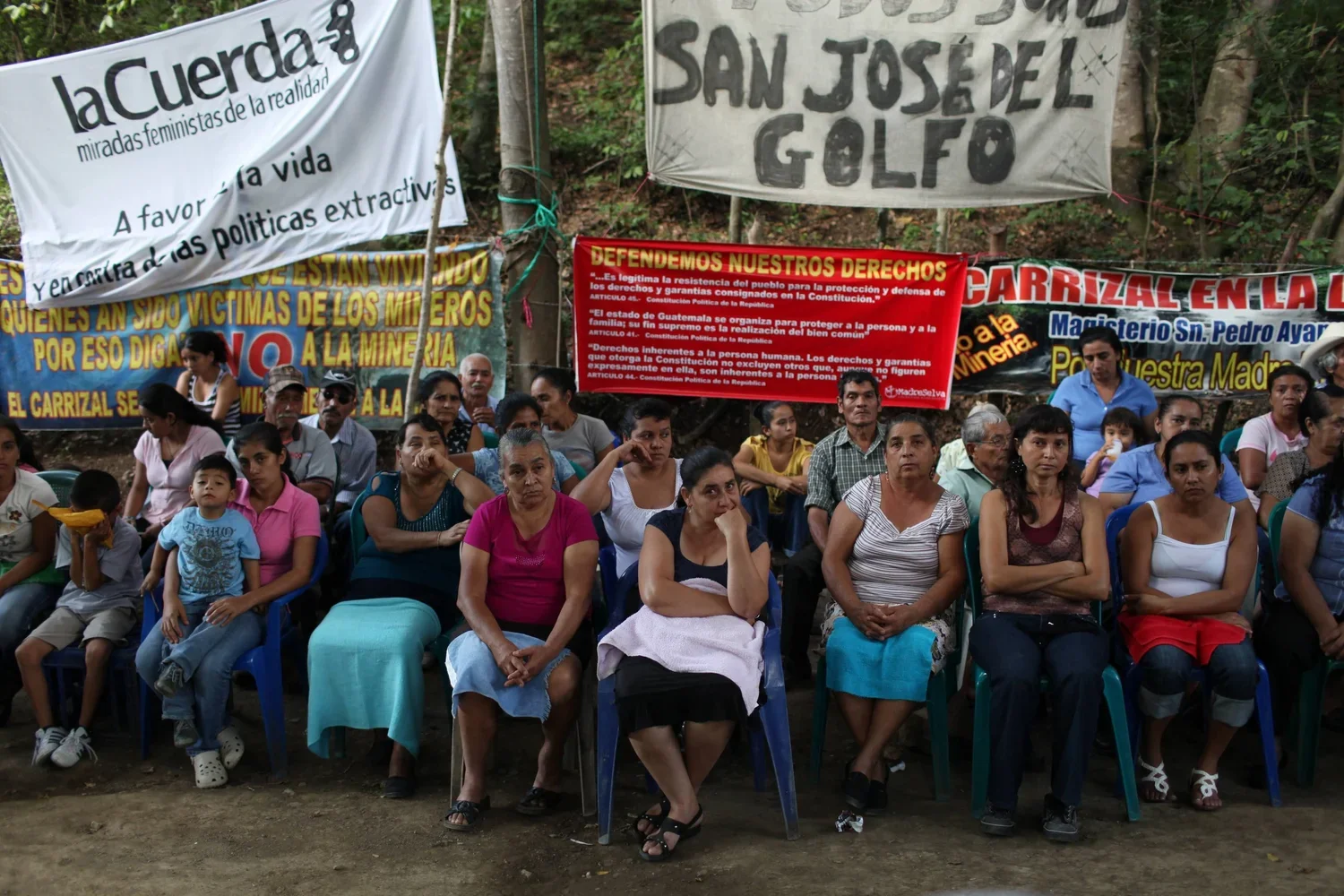 Figure 12. La Puya Resistance against Unwanted Gold Mine. Community defenders block the entrance gate to El Tambor gold mine, owned by EXMINGUA, local subsidiary of Canadian mining company Radius Gold (later of American company KCA). Since March 2, 2
