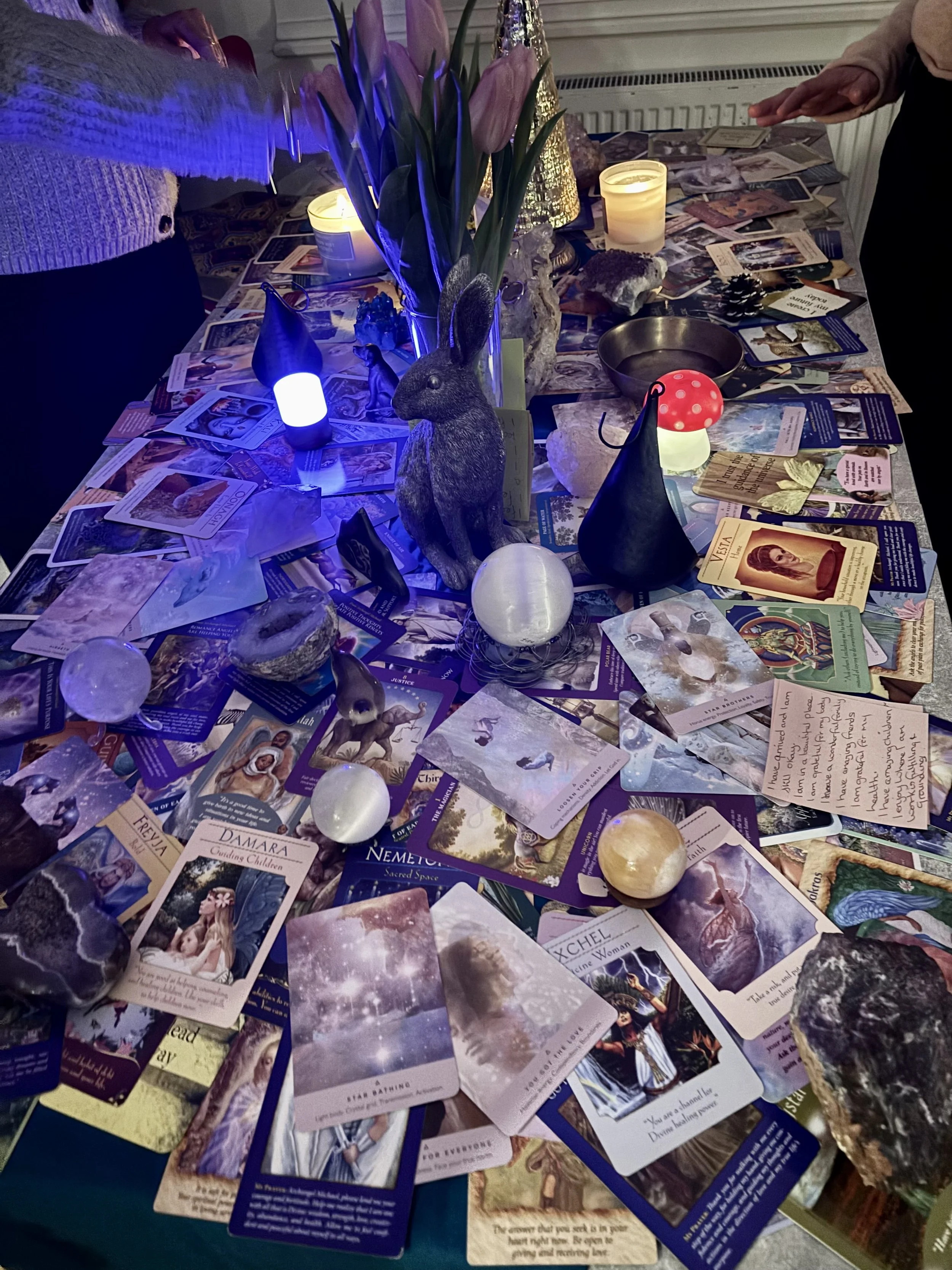 Angel Cards set up for an Angel Therapy Reading with crystals and soft lights.