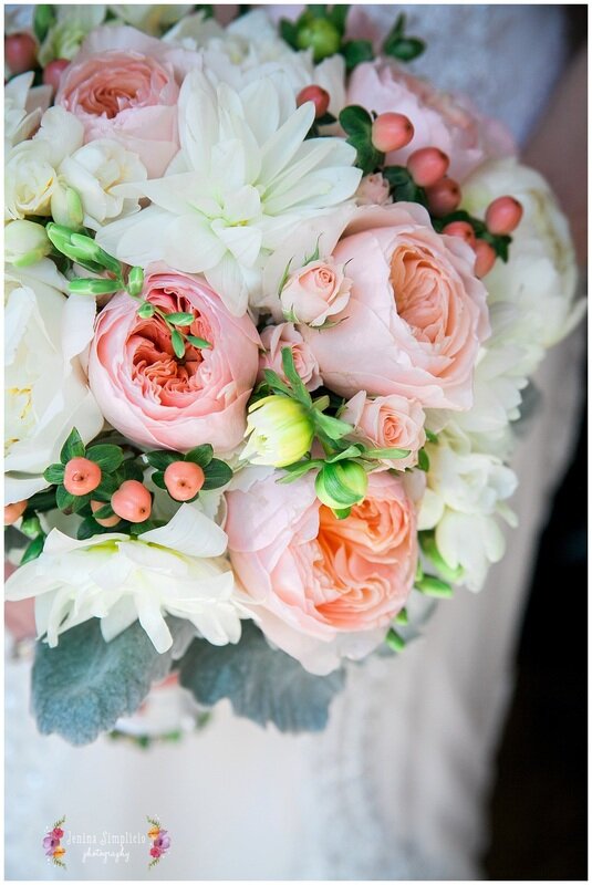  bouquet against the wedding dress of the bride 