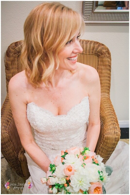  bride waiting to walk down the aisle with the bouquet 