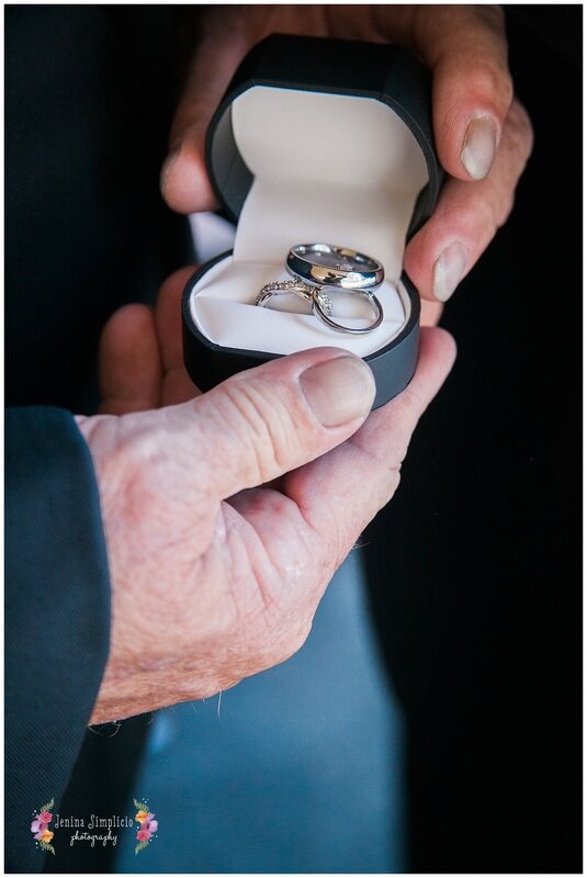  close up on the wedding bands in the box 