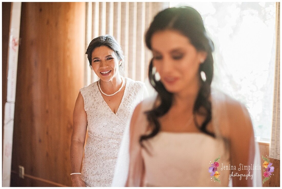  bride and mom getting ready in the sunlight 