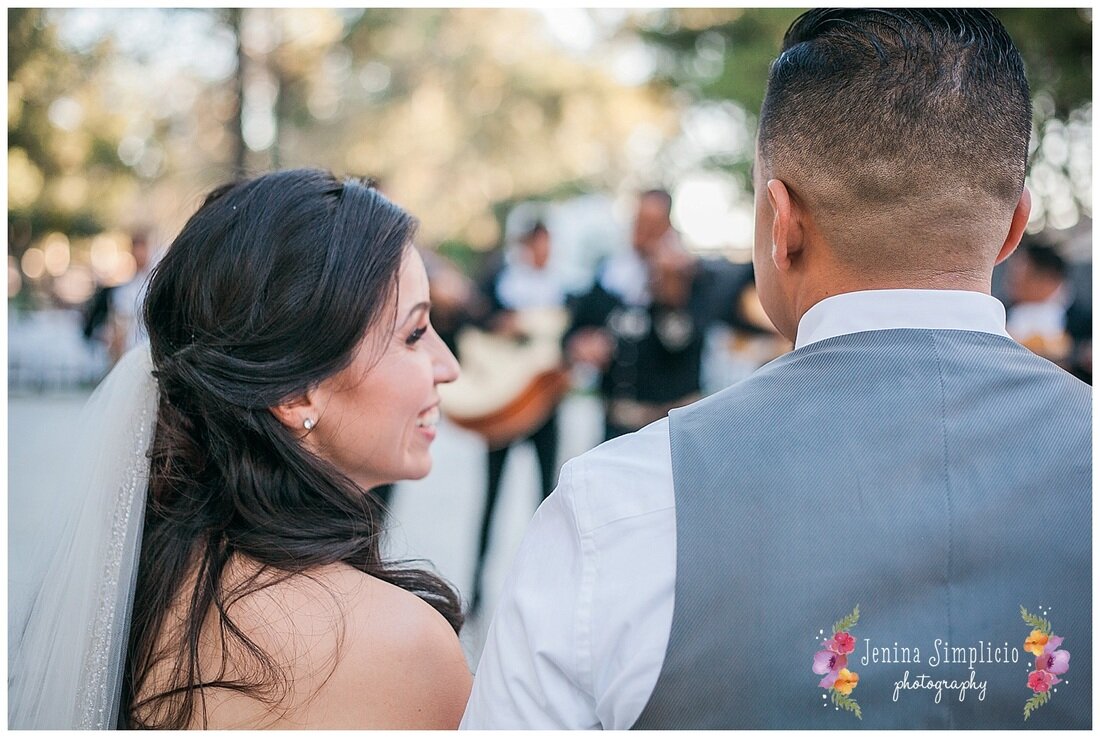  Bride looks at groom with joy 