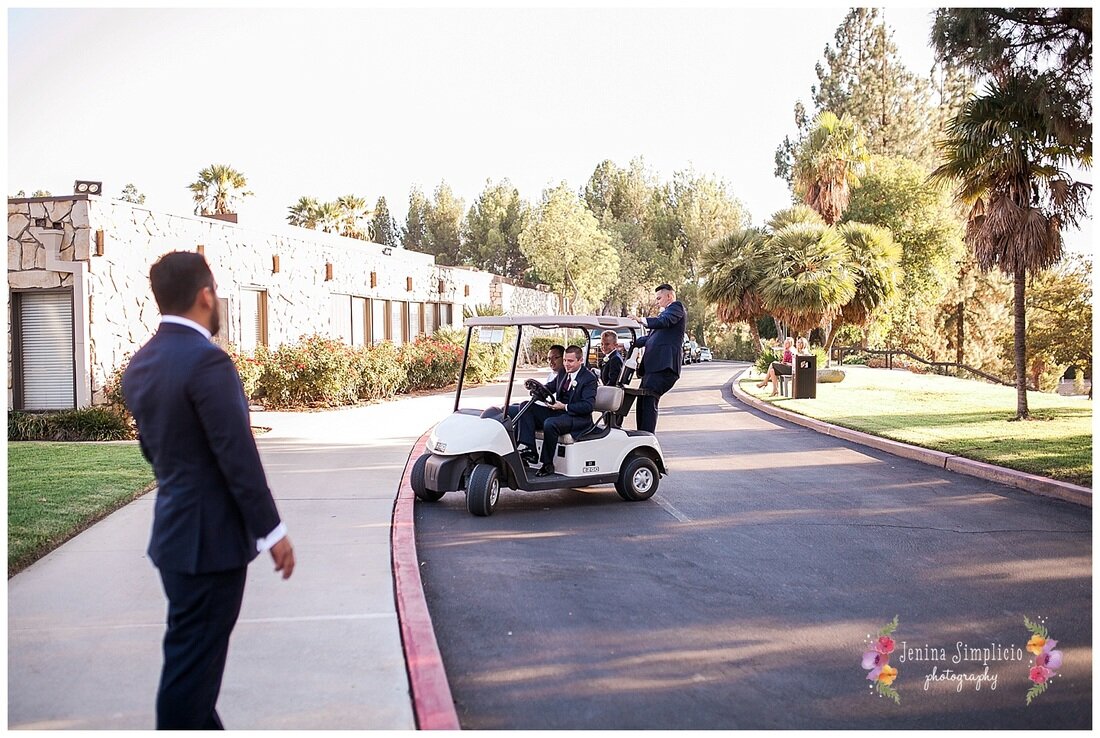  groomsmen arriving to the ceremony on a gold cart 