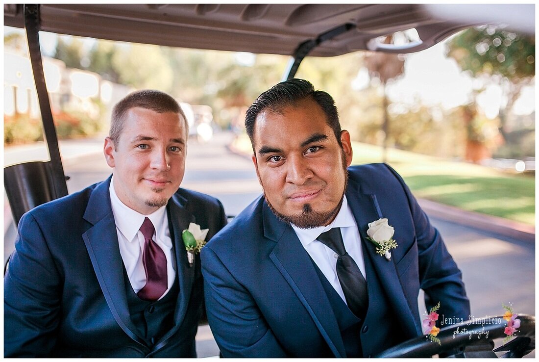  groom and best man arriving to the ceremony on a gold cart 
