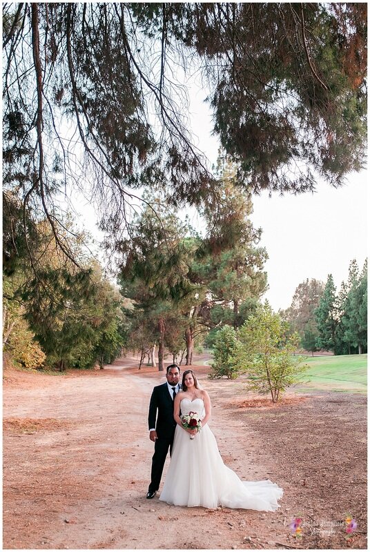  bride and groom in the open dirt road 