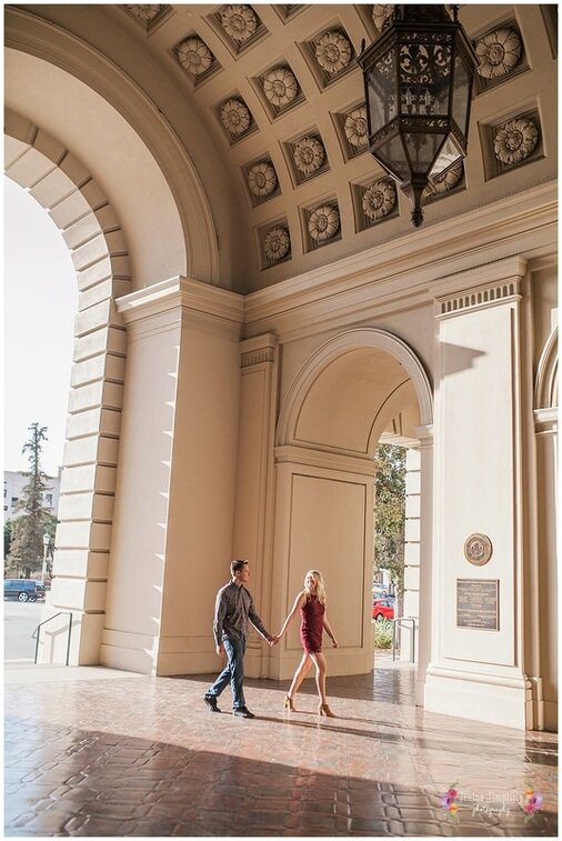  bride and groom walking into the reception hall 