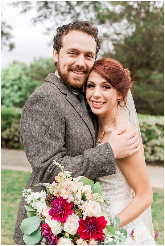  bride and groom together in the garden 