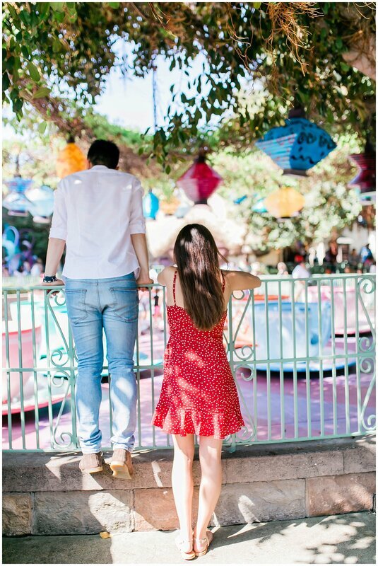  engaged couple in front of the carousel 