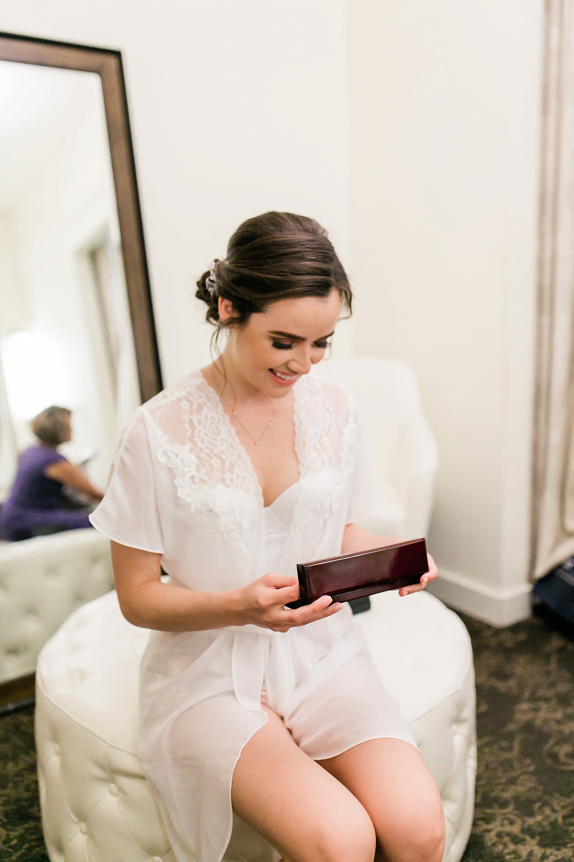  bride opening a gift 