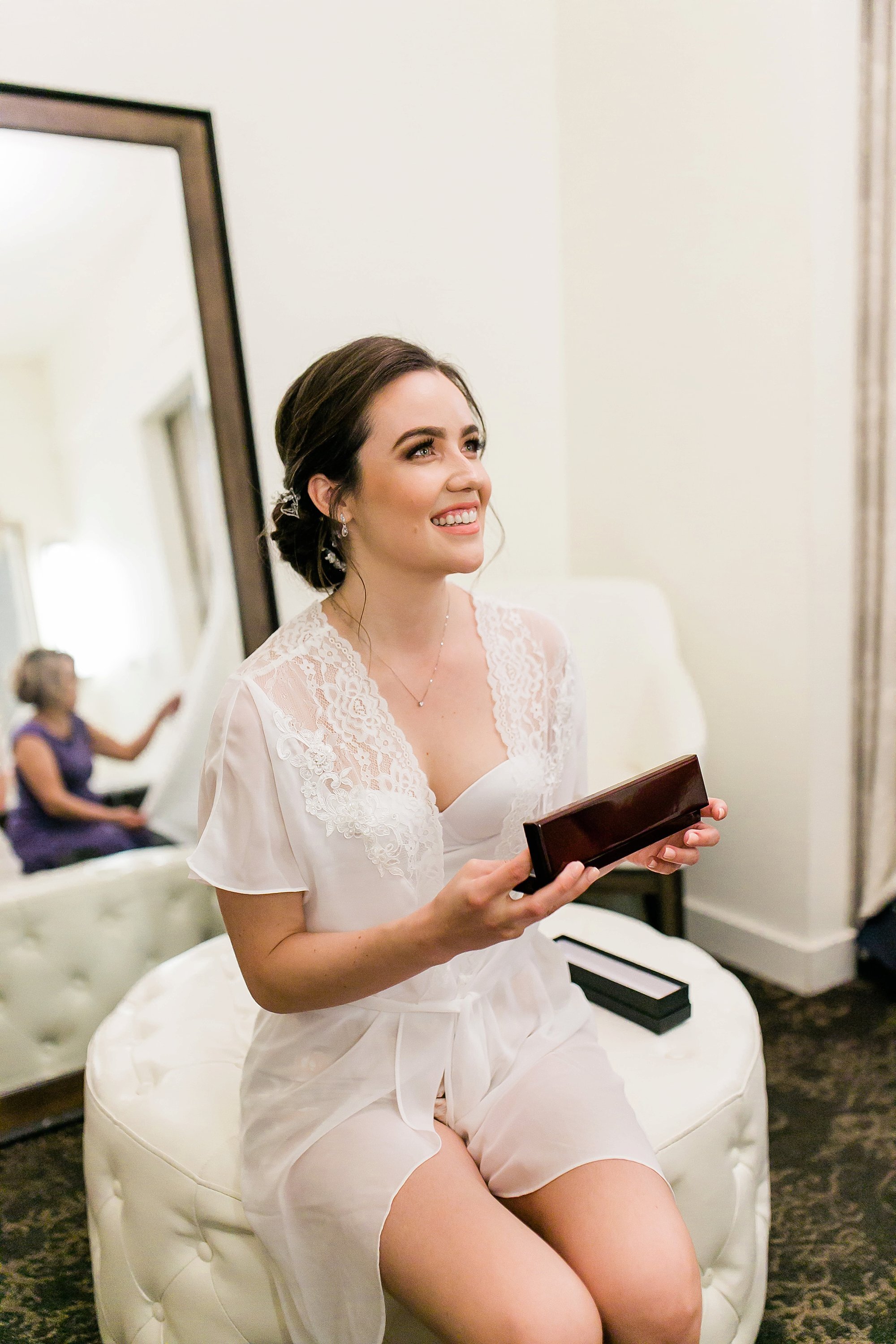  bride opening a gift 