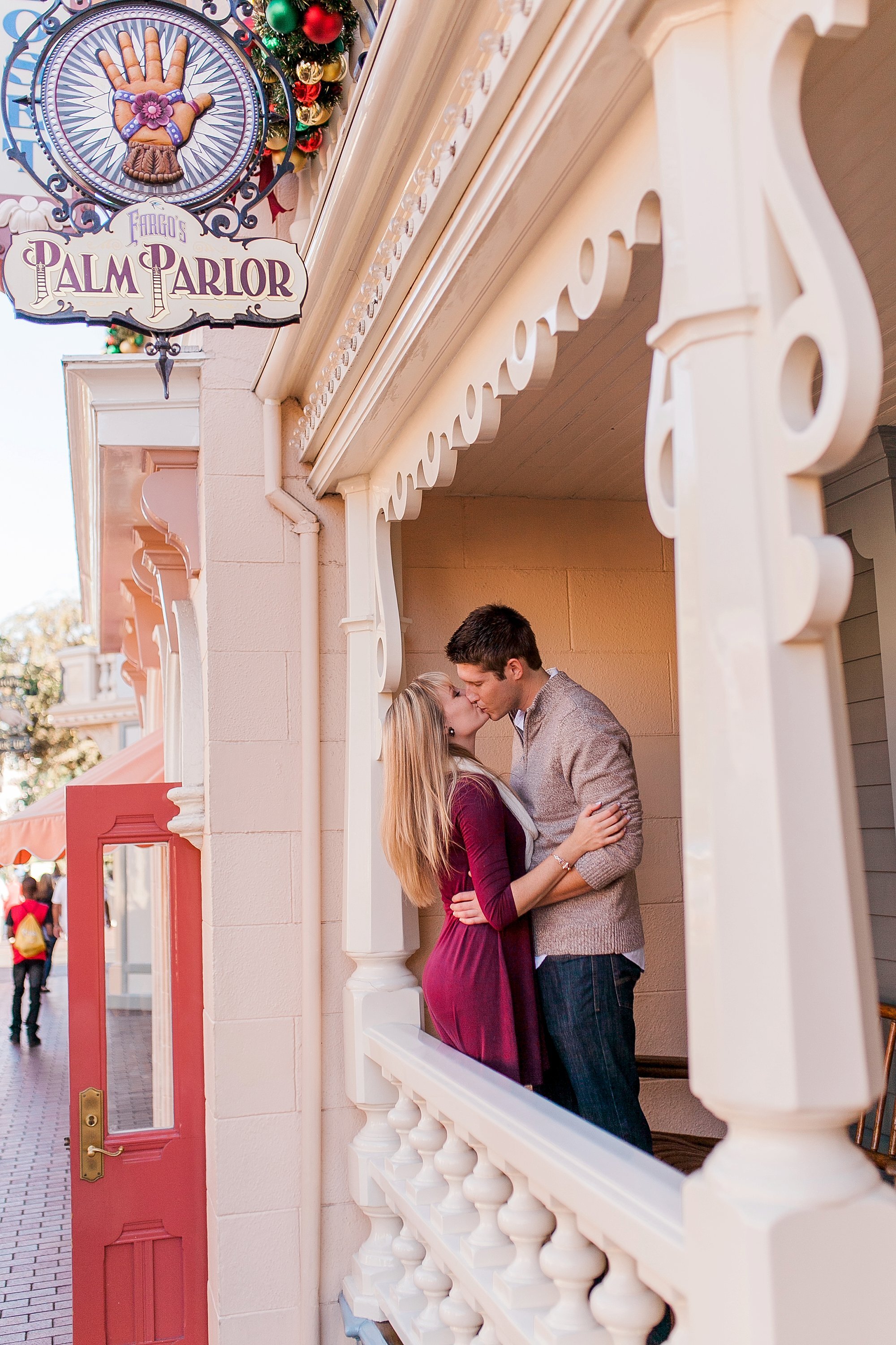  newly engaged couple kissing at the palm parlor 